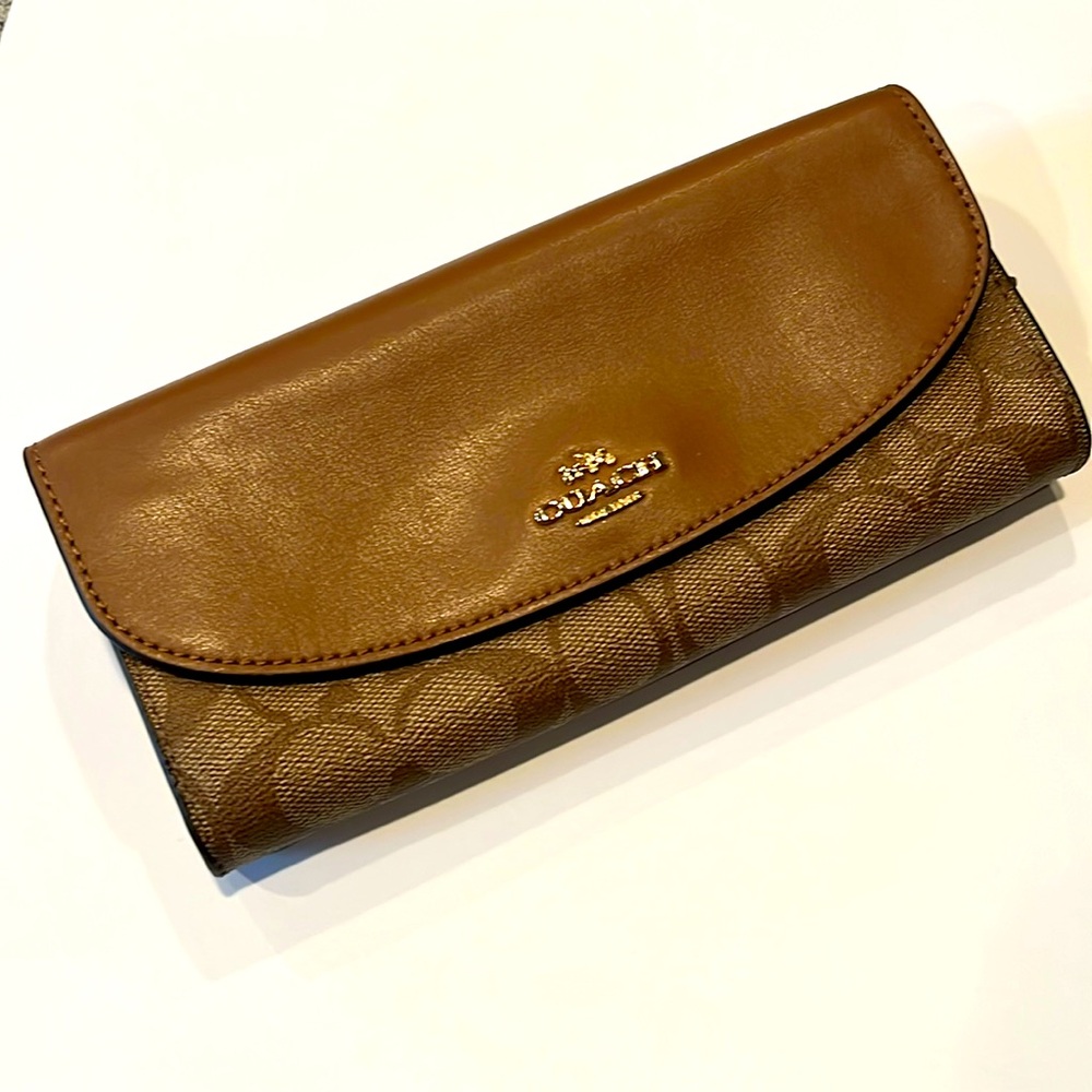 Coach Slim envelope wallet in signature logo canvas